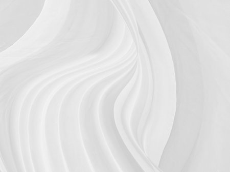 abstract clean woven beautiful soft fabric smooth curve shape decorative fashion textile silver white backgroundの写真素材
