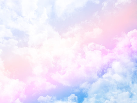 beauty sweet pastel pink and orange colorful with fluffy clouds on sky. multi color rainbow image. abstract fantasy growing lightの写真素材