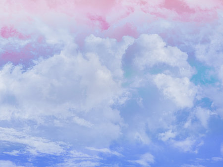 beauty sweet pastel red and blue colorful with fluffy clouds on sky. multi color rainbow image. abstract fantasy growing lightの写真素材