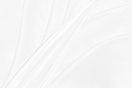 Clean fashion soft fabric textile woven beautiful abstract smooth curve shape decorative white and gray backgroundの写真素材