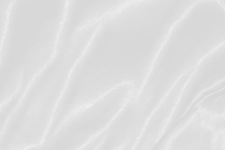 Clean soft fabric woven beautiful abstract smooth curve shape decorative corner fashion textile white backgroundの写真素材