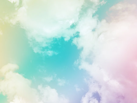 beauty sweet pastel green and pink colorful with fluffy clouds on sky. multi color rainbow image. abstract fantasy growing lightの写真素材