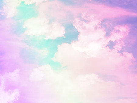 beauty sweet pastel green and pink colorful with fluffy clouds on sky. multi color rainbow image. abstract fantasy growing lightの写真素材