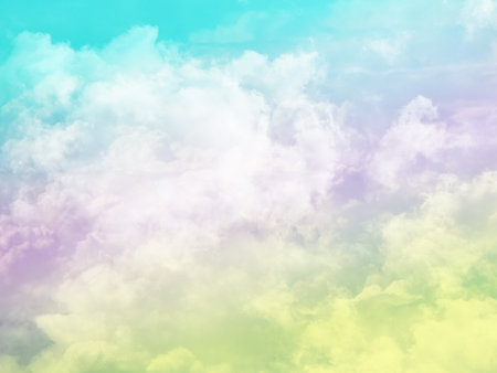beauty sweet pastel blue yellow colorful with fluffy clouds on sky. multi color rainbow image. abstract fantasy growing lightの写真素材