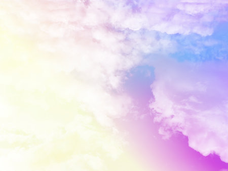 beauty sweet pastel pink and yellow colorful with fluffy clouds on sky. multi color rainbow image. abstract fantasy growing lightの写真素材