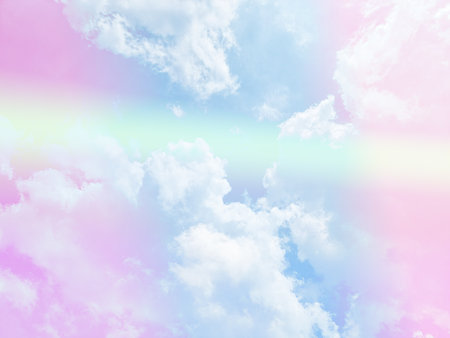 beauty sweet pastel blue and pink colorful with fluffy clouds on sky. multi color rainbow image. abstract fantasy growing lightの写真素材