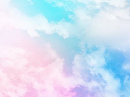 beauty sweet pastel pink and blue colorful with fluffy clouds on sky. multi color rainbow image. abstract fantasy growing lightの写真素材