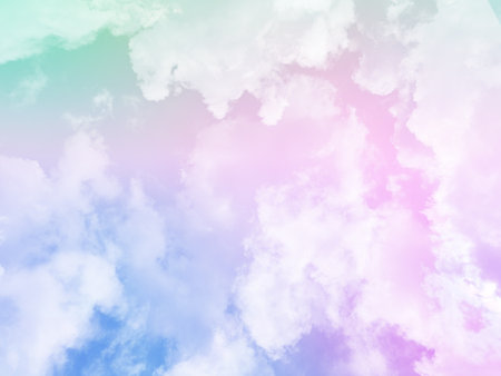 beauty sweet pastel blue and pink colorful with fluffy clouds on sky. multi color rainbow image. abstract fantasy growing lightの写真素材