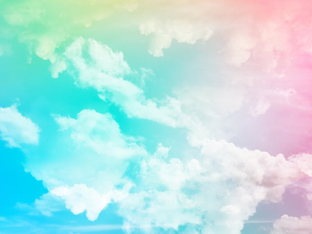beauty sweet pastel pink and blue colorful with fluffy clouds on sky. multi color rainbow image. abstract fantasy growing lightの写真素材