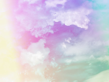 beauty sweet pastel green and yellow colorful with fluffy clouds on sky. multi color rainbow image. abstract fantasy growing lightの写真素材