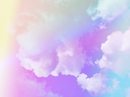beauty sweet pastel violet and yellow colorful with fluffy clouds on sky. multi color rainbow image. abstract fantasy growing lightの写真素材