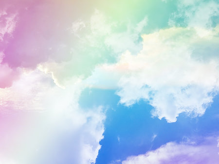 beauty sweet pastel blue and pink colorful with fluffy clouds on sky. multi color rainbow image. abstract fantasy growing lightの写真素材