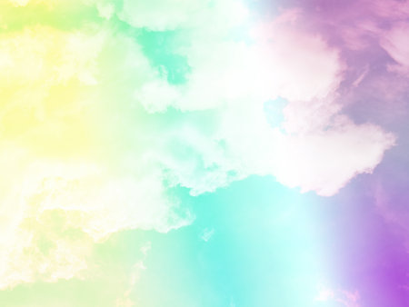 beauty sweet pastel yellow and purple colorful with fluffy clouds on sky. multi color rainbow image. abstract fantasy growing lightの写真素材