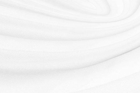 white elegrance soft fabric abstract smooth curve shape decorate fashion textile backgroundの写真素材