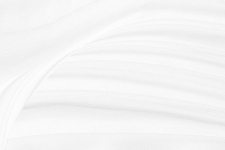 soft fabric white abstract smooth curve shape elegrance decorative fashion textile backgroundの写真素材