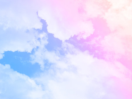 beauty sweet pastel blue and pink colorful with fluffy clouds on sky. multi color rainbow image. abstract fantasy growing lightの写真素材