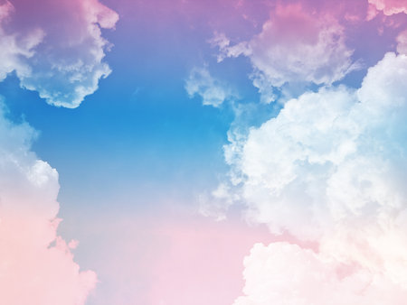 beauty sweet pastel orange and pink colorful with fluffy clouds on sky. multi color rainbow image. abstract fantasy growing lightの写真素材