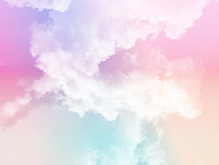 beauty sweet pastel pink and orange colorful with fluffy clouds on sky. multi color rainbow image. abstract fantasy growing lightの写真素材