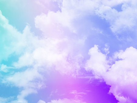 beauty sweet pastel pink and purple colorful with fluffy clouds on sky. multi color rainbow image. abstract fantasy growing lightの写真素材