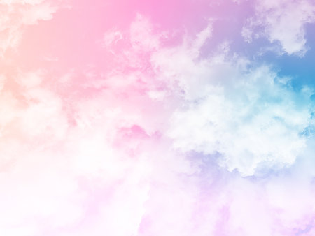 beauty sweet pastel pink and orange colorful with fluffy clouds on sky. multi color rainbow image. abstract fantasy growing lightの写真素材