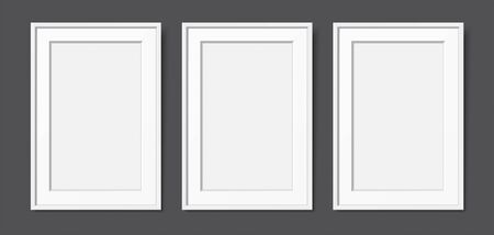 3 white wooden frames with passepartout, hanging on the dark wall background. Realistic blank frames mockup, for text or image placement. Empty elegant frames vector template with copy space.のイラスト素材