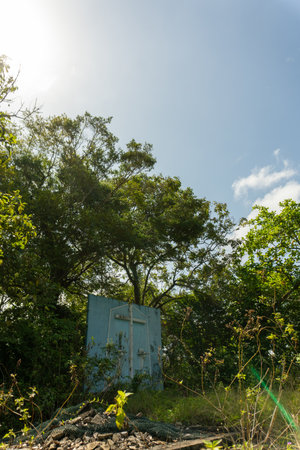 Overgrown site of an abandoned church once used by Vietnamese refugees in Pulau Bidong. A solemn symbol of history and faith.の写真素材