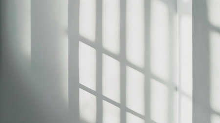 Shadow of window on white wall background. Sunlight from window.の素材