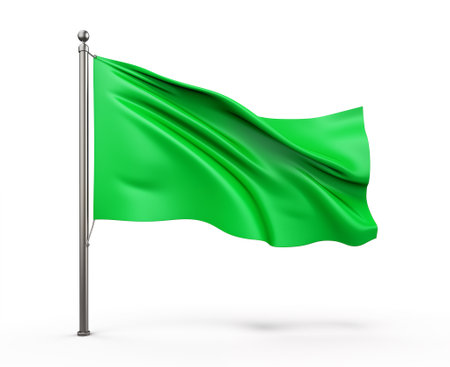Green flag waving on white background. Isolated 3D image.の素材