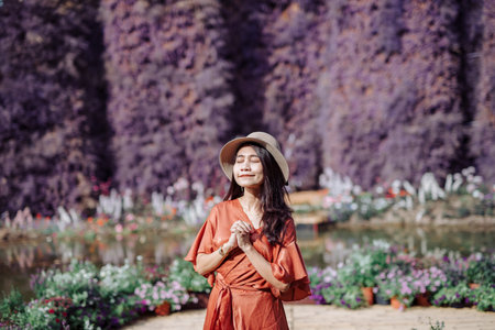 A young man's hand touched on a tablet, modern technology concept, empty space for text, studio photo on a black background.の写真素材