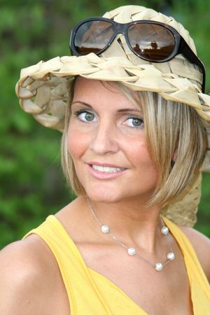 Yellow Summer girl with sun glassesの写真素材