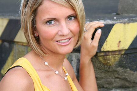 Yellow Summer girl with sun glassesの写真素材