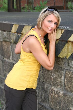 Yellow Summer girl with sun glassesの写真素材