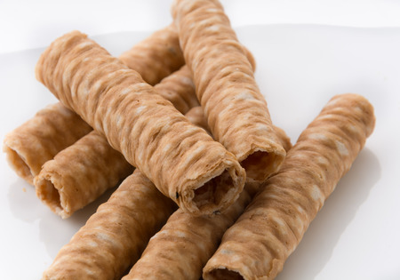 wafer roll on white plateの写真素材