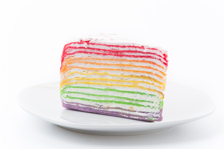 Rainbow crepe cake isolated on white backgroundの写真素材