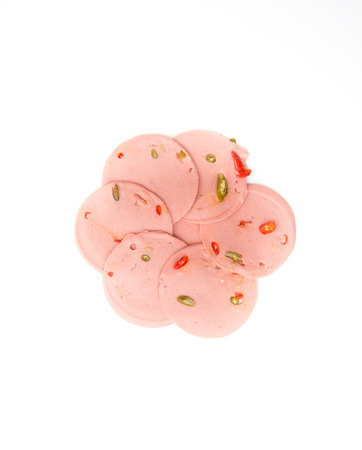 baloney sausage isolated on white backgroundの写真素材