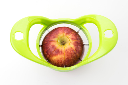 apple cutter isolated on white backgroundの写真素材