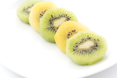 Kiwi and Golden Kiwi fruit isolated on white backgroundの写真素材