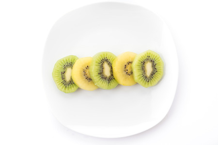 Kiwi and Golden Kiwi fruit isolated on white backgroundの写真素材