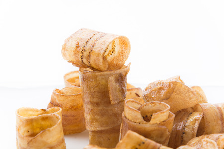 banana rolls isolated on white backgroundの写真素材
