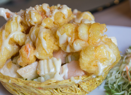 Shrimp fried with cream salad on taro cup friedの写真素材