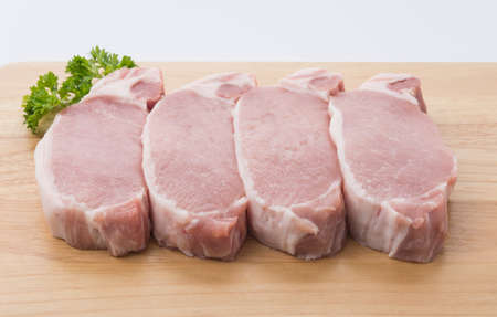 raw meat pork steak isolatedの写真素材