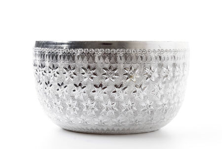 Old silver bowl isolated on white backgroundの写真素材