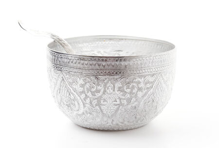 Old silver bowl isolated on white backgroundの写真素材