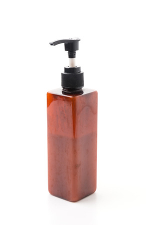 lotion bottle isolated on whiteの写真素材