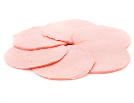baloney sausage isolated on white backgroundの写真素材
