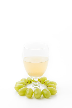 white grapes juice isolated on white backgroundの写真素材