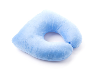 blue neck pillows isolated on white backgroundの写真素材
