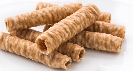 wafer roll on white plateの写真素材