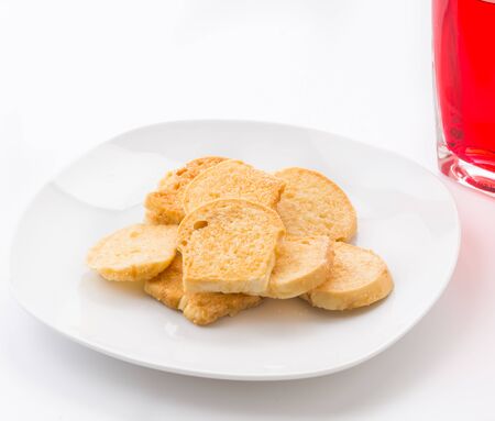 garlic bread on white plate