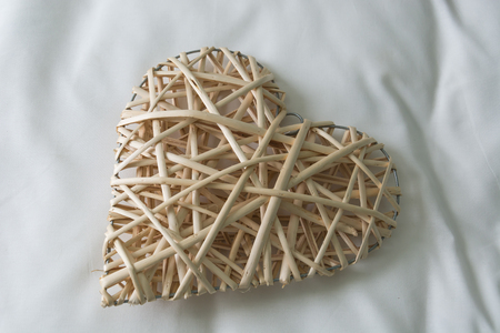 weaving heart on white backgroundの写真素材